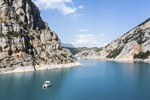 Spain, Aragon, Huesca, Mont-Rebei, Boat in the Montrebei's reservoir Spain, Aragon, Huesca, Mont-Rebei, Boat in the Montrebei's reservoir