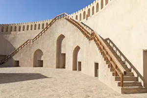 Stairs leading up to the circular wall in the restored Bahla Fort, Tanuf, Oman Stairs leading up to the circular wall in the restored Bahla Fort, Tanuf, Oman