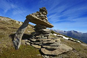 Steinmann or stone man at the summit of evil Weibele in the Deferegger group, Carnic Steinmann or stone man at the summit of evil Weibele in the Deferegger group, Carnic
