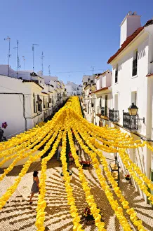 Streets decorated with paper flowers. People festivities (Festas do Povo). Campo Maior Streets decorated with paper flowers. People festivities (Festas do Povo). Campo Maior
