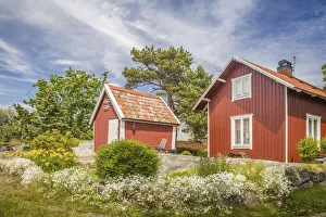 Summer houses in Landsort on the archipelago island of A-ja,Stockholm County, Sweden Summer houses in Landsort on the archipelago island of A-ja,Stockholm County, Sweden