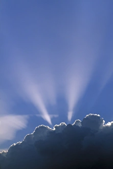 Cloudy Day Photos Prints: Sun rays through clouds