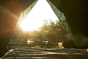 Sun rises into safari tent, from the bed, Tanzania Sun rises into safari tent, from the bed, Tanzania