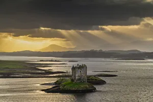 Sunrays over Castle Stalker, Appin, Argyll & Bute, Scotland Sunrays over Castle Stalker, Appin, Argyll & Bute, Scotland