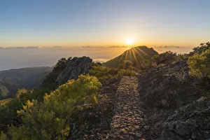 Sunrise over the clouds on the trail to Pico Ruivo Sunrise over the clouds on the trail to Pico Ruivo