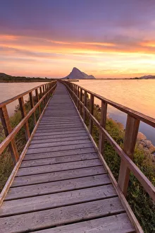 Sunrise from a pedestrian walkway. Porto Taverna, Loiri Porto San Paolo, Olbia Tempio Sunrise from a pedestrian walkway. Porto Taverna, Loiri Porto San Paolo, Olbia Tempio