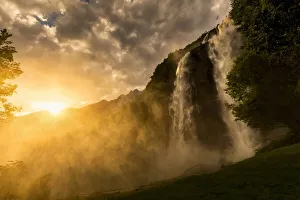 Sunset at Acquafraggia Waterfall in spring. Valchiavenna, Valtellina, Lombardy, Italy Sunset at Acquafraggia Waterfall in spring. Valchiavenna, Valtellina, Lombardy, Italy