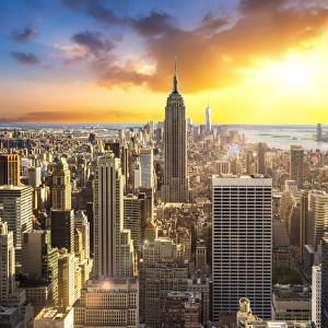 Sunset over Manhattan with view towards the Empire State Building, New York City, USA Sunset over Manhattan with view towards the Empire State Building, New York City, USA