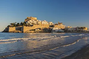 Sunset view over the fortified town of Peniscola, Comunidad Valenciana, Spain Sunset view over the fortified town of Peniscola, Comunidad Valenciana, Spain