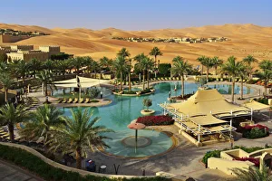 The swimming pool of the desert luxury hotel Anantara Qasr Al Sarab in the Empty Quarter The swimming pool of the desert luxury hotel Anantara Qasr Al Sarab in the Empty Quarter