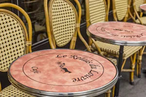 Tables and chairs outside a cafe, Paris, France Tables and chairs outside a cafe, Paris, France