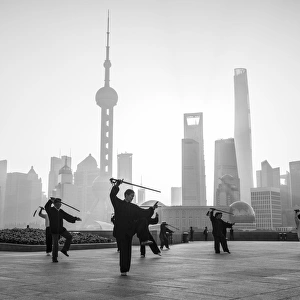 Tai Chi on The Bund (with Pudong skyline behind), Shanghai, China Tai Chi on The Bund (with Pudong skyline behind), Shanghai, China