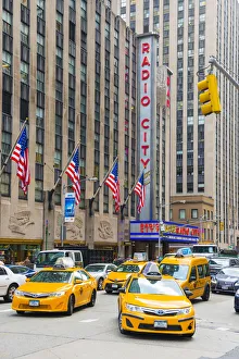 Taxi cabs outside Radio city, New York, USA Taxi cabs outside Radio city, New York, USA
