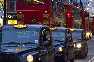 Taxis and Buses, Oxford Street, London, England Taxis and Buses, Oxford Street, London, England