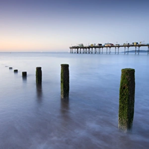 Teignmouth Pier and coastal defences at Teignmouth, South Devon, England. Summer Teignmouth Pier and coastal defences at Teignmouth, South Devon, England. Summer
