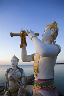 Thailand, Ko Samet, Saikaew Beach, Flute Player and Mermaid Statue Thailand, Ko Samet, Saikaew Beach, Flute Player and Mermaid Statue