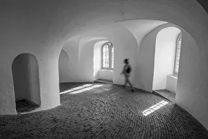 A tourist walks down the equestrian staircase (riders staircase) A tourist walks down the equestrian staircase (riders staircase)