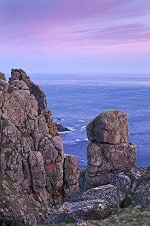 Towering granite cliffs at Gwennap Head near Lands End, Cornwall, England. Spring Towering granite cliffs at Gwennap Head near Lands End, Cornwall, England. Spring