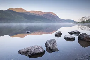 Tranquil morning on Llyn Cwellyn in Snowdonia National Park, Wales, UK. Spring Tranquil morning on Llyn Cwellyn in Snowdonia National Park, Wales, UK. Spring