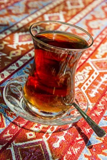 Turkish tea served in the typical tulip shaped glass Turkish tea served in the typical tulip shaped glass
