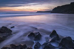 Twilight over Mewslade Bay on the Gower Peninsula, South Wales, UK Twilight over Mewslade Bay on the Gower Peninsula, South Wales, UK