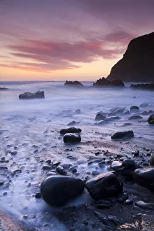 Twilight on the rocky beach at Duckpool on the North Cornish Coastline, Cornwall, England Twilight on the rocky beach at Duckpool on the North Cornish Coastline, Cornwall, England