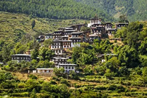 Typical bhutanese houses with temple on top. Timphu district, Bhutan Typical bhutanese houses with temple on top. Timphu district, Bhutan