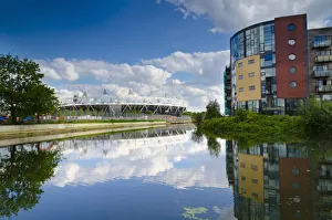 UK, England, London, Hackney Wick, River Lee Navigation and London 2012 Olympic Stadium UK, England, London, Hackney Wick, River Lee Navigation and London 2012 Olympic Stadium