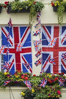 UK, England, London, Kensington, The Churchill Arms Pub with Union Jack bunting to UK, England, London, Kensington, The Churchill Arms Pub with Union Jack bunting to