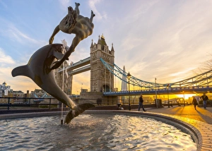 UK, England, London, Tower Bridge over River Thames, Girl with a Dolphin fountain UK, England, London, Tower Bridge over River Thames, Girl with a Dolphin fountain
