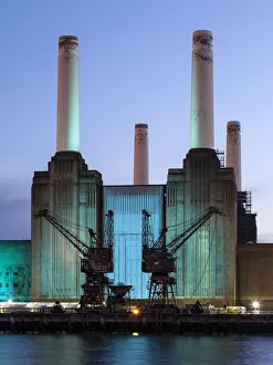 UK, London, Battersea power station illuminated by colored light at dusk UK, London, Battersea power station illuminated by colored light at dusk