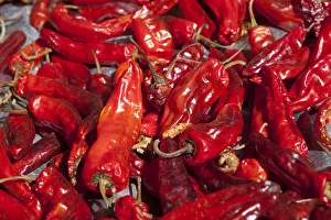 Ura, Bhutan. Red chilli peppers drying in the sun Ura, Bhutan. Red chilli peppers drying in the sun