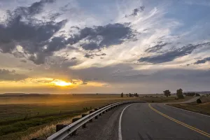 USA, Montana, Bozeman, rural road at sunset USA, Montana, Bozeman, rural road at sunset