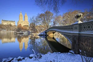 Usa, New York City, Manhattan, Central Park, Bow Bridge and Upper West Side Buildings Usa, New York City, Manhattan, Central Park, Bow Bridge and Upper West Side Buildings