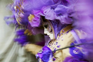 Venice, Veneto, Italy; A mask in movement on Piazza San Marco during Carnival Venice, Veneto, Italy; A mask in movement on Piazza San Marco during Carnival