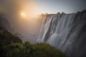 Victoria Falls Collection: Victoria falls at sunset, depicted from Zambian side