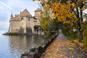 View of the Chillon castle and its lake front in autumn View of the Chillon castle and its lake front in autumn