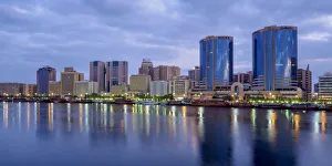 View over Dubai Creek towards Deira at dawn, Dubai, United Arab Emirates View over Dubai Creek towards Deira at dawn, Dubai, United Arab Emirates