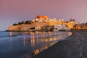 View at dusk over the fortified seaport of Peniscola, Comunidad Valenciana, Spain View at dusk over the fortified seaport of Peniscola, Comunidad Valenciana, Spain