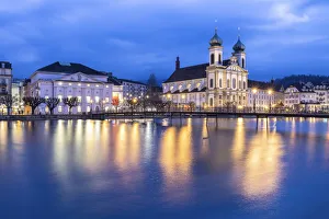 View of the Jesuit Church and the old town of Lucerne at blue hour reflected on the Reuss View of the Jesuit Church and the old town of Lucerne at blue hour reflected on the Reuss