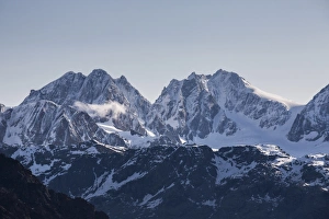 View of the snowy peak Bernina and peak Roseg at summer Malenco Valley Valtellina View of the snowy peak Bernina and peak Roseg at summer Malenco Valley Valtellina