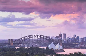 View of Sydney Harbour Bridge and Sydney Opera House at sunset, Sydney, New South Wales View of Sydney Harbour Bridge and Sydney Opera House at sunset, Sydney, New South Wales