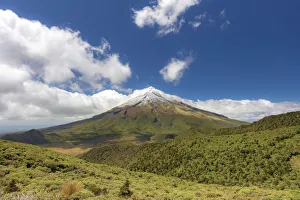 View of the Taranaki volcano in New Zealand northern island on a sunny day View of the Taranaki volcano in New Zealand northern island on a sunny day