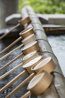Water ladles at Shinto shrine of Sumiyoshi Taisha, Osaka, Kansai, Japan Water ladles at Shinto shrine of Sumiyoshi Taisha, Osaka, Kansai, Japan