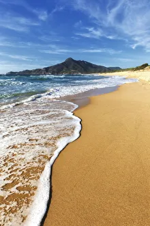 Waves on the sand beach of San Nicolo, Buggerru, Sud Sardegna province, Sardinia Waves on the sand beach of San Nicolo, Buggerru, Sud Sardegna province, Sardinia