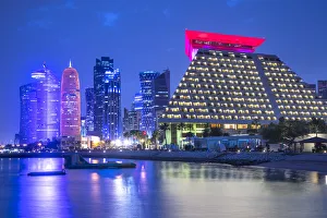 West Bay skyline with Burj Doha & Sheraton Grand Hotel, Doha, Qatar West Bay skyline with Burj Doha & Sheraton Grand Hotel, Doha, Qatar