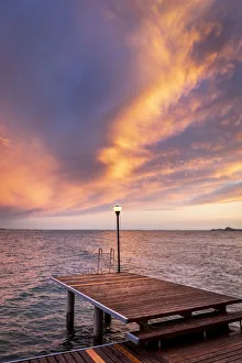 Western side of Garda lake during a cloudy sunset. Toscolano Maderno, Brescia Province Western side of Garda lake during a cloudy sunset. Toscolano Maderno, Brescia Province