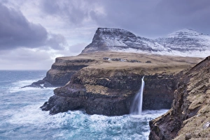 Wintry conditions at Gasadalur on the island of Vagar, Faroe Islands, Denmark, Europe Wintry conditions at Gasadalur on the island of Vagar, Faroe Islands, Denmark, Europe