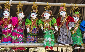 Yoke the, traditional Burmese marionettes, on sale in the local market, Bagan, Mandalay Yoke the, traditional Burmese marionettes, on sale in the local market, Bagan, Mandalay