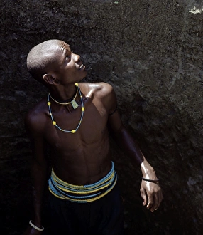 Africa Ethnic Groups Prints: Young Datoga man in a well